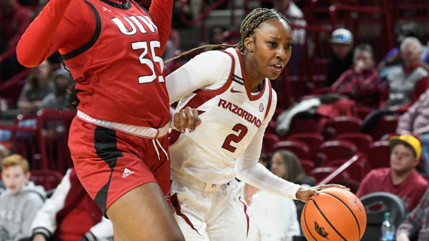 Razorbacks' Samara Spencer drives inside against Incarnate Word